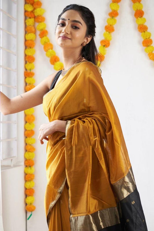 Mesmeric Yellow Black Soft Banarasi Silk Saree With Opulent Blouse Piece