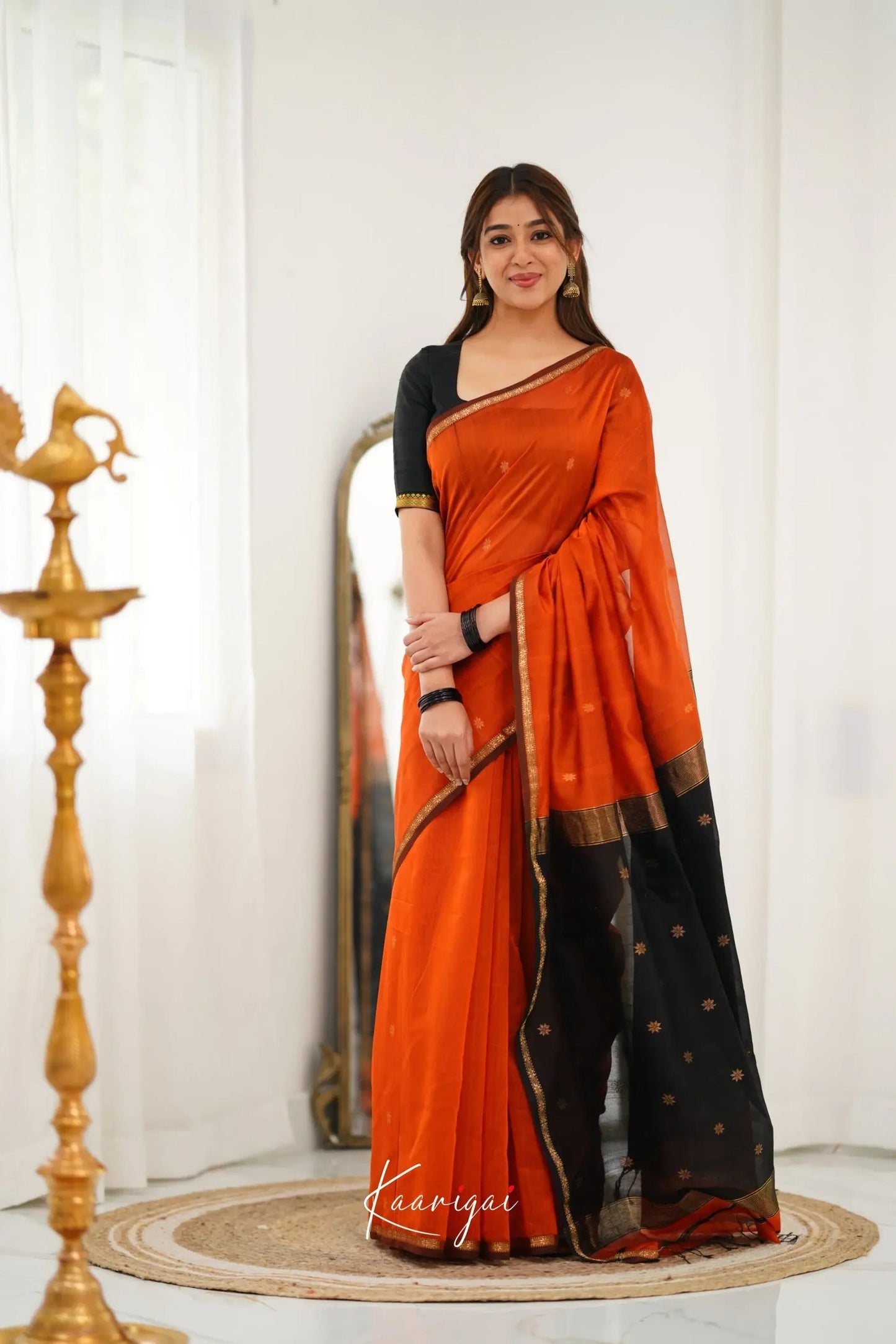 Mesmeric Orange Black Soft Banarasi Silk Saree With Opulent Blouse Piece