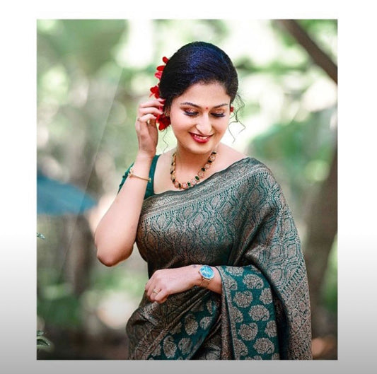 Surpassing Dark Green Soft Silk Saree With Dazzling Blouse Piece