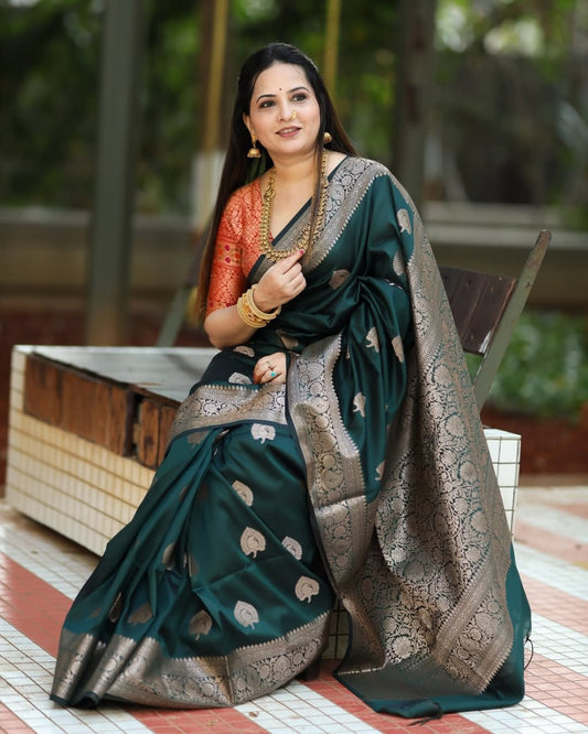 Surpassing Dark Green Soft Silk Saree With Dazzling Blouse Piece