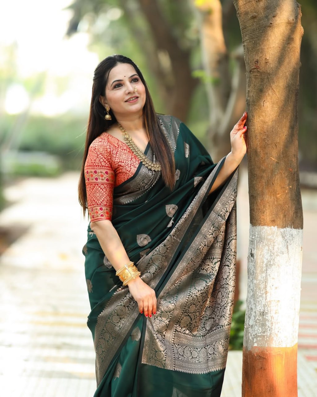 Surpassing Dark Green Soft Silk Saree With Dazzling Blouse Piece