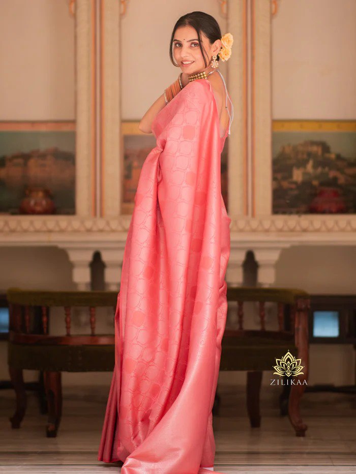 Gleaming Peach Soft Banarasi Silk Saree With Energetic Blouse Piece