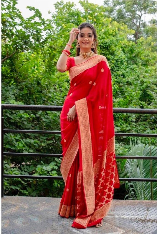 A glam Red Soft Silk Saree With Classic Blouse Piece