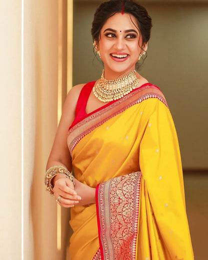Designer Yellow Soft Banarasi Silk Saree With Flamboyant Blouse Piece