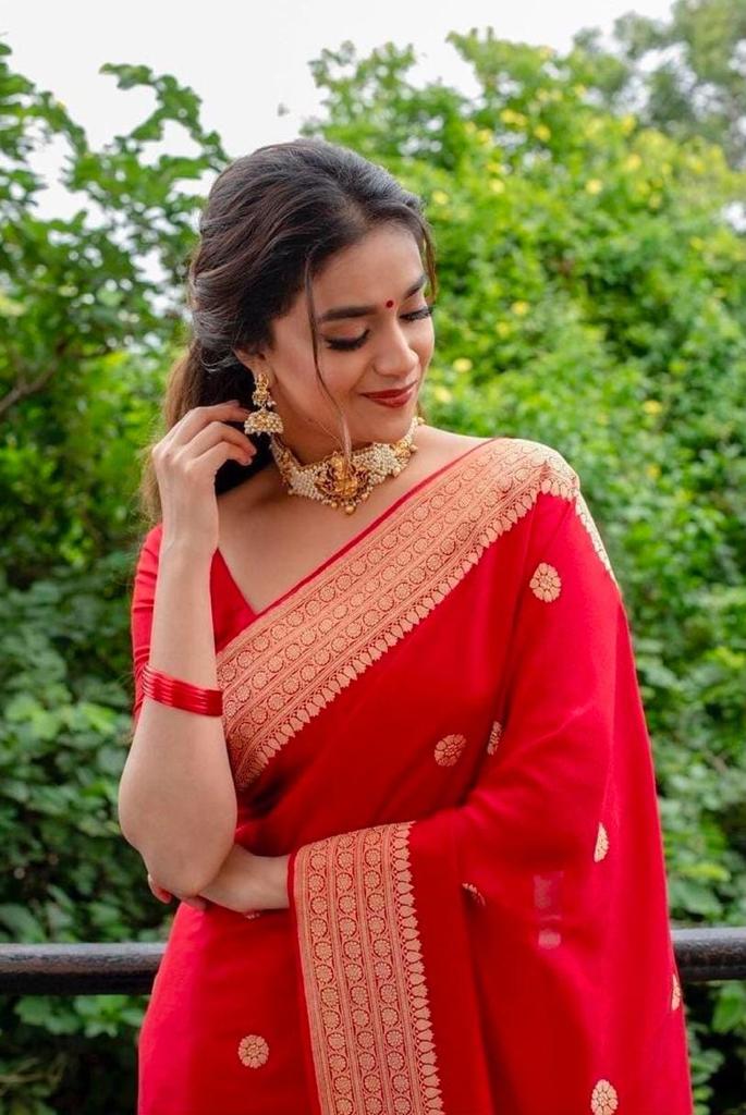 A glam Red Soft Silk Saree With Classic Blouse Piece