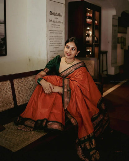 Marvellous Orange Soft Silk Saree With Unique Blouse Piece