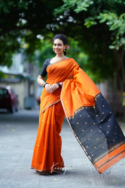 Enigmatic Orange Cotton Silk Saree With Panache Blouse Piece