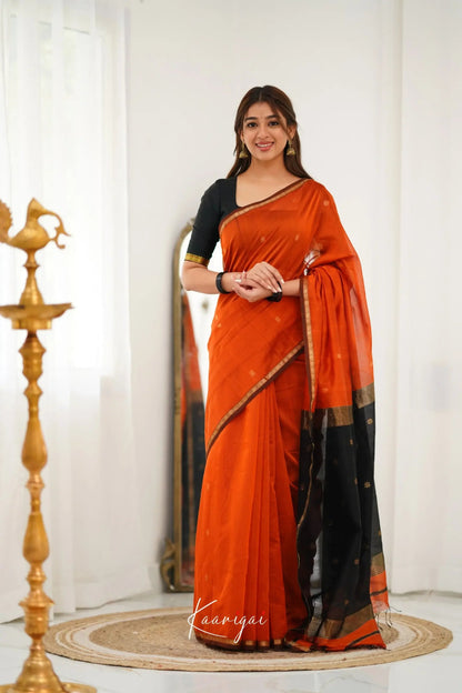 Mesmeric Orange Black Soft Banarasi Silk Saree With Opulent Blouse Piece