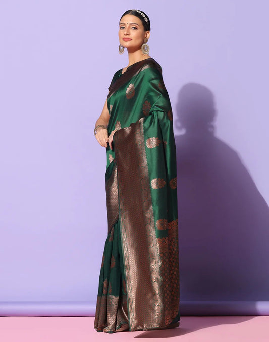 Surpassing Dark Green Soft Silk Saree With Dazzling Blouse Piece