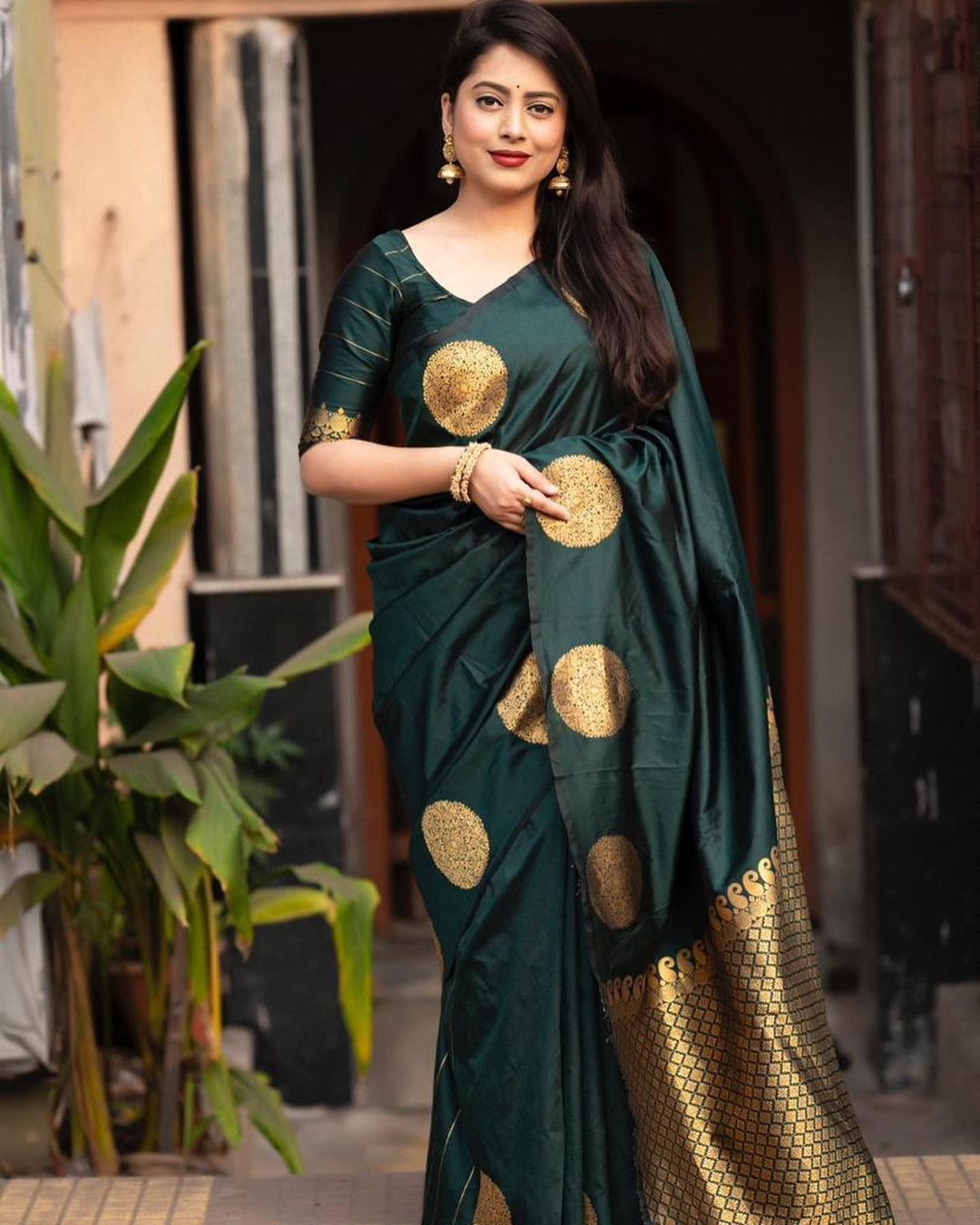 Blooming Dark Green Soft Banarasi Silk Saree With Intricate Blouse Piece