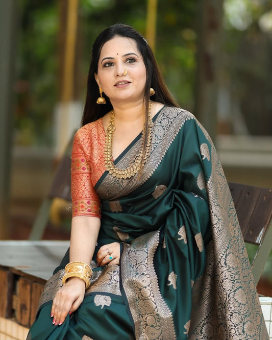 Surpassing Dark Green Soft Silk Saree With Dazzling Blouse Piece
