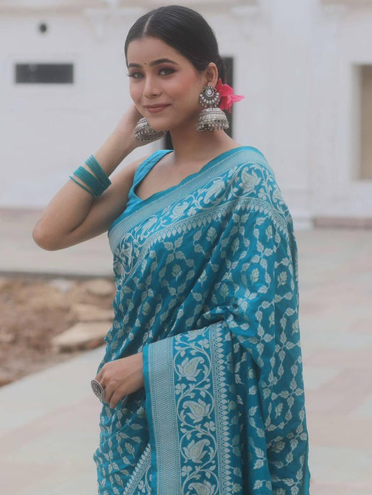Evocative Blue Soft Silk Saree With Demure Blouse Piece