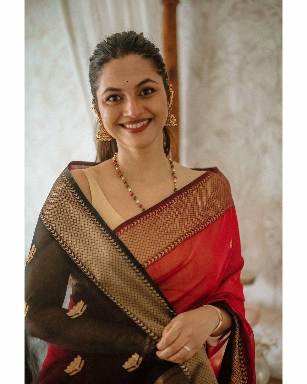 Marvellous Orange Soft Silk Saree With Unique Blouse Piece