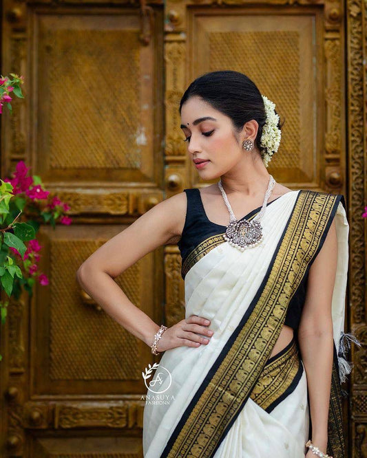 Moiety Off White Soft Banarasi Silk Saree With Panoply Blouse Piece