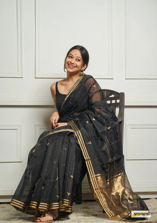 Beauteous Black Soft Silk Saree With Twirling Blouse Piece