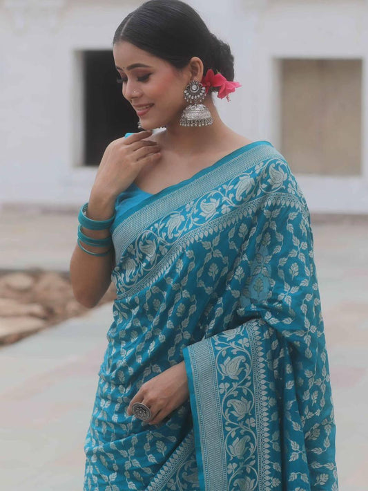 Evocative Blue Soft Silk Saree With Demure Blouse Piece