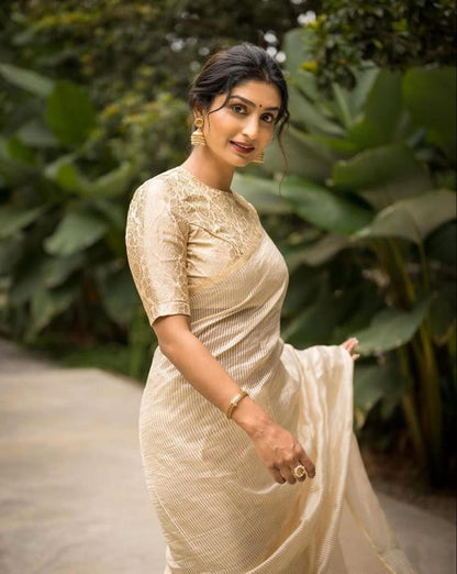 Lissome Cream Soft Silk Saree with Mellifluous Blouse Piece