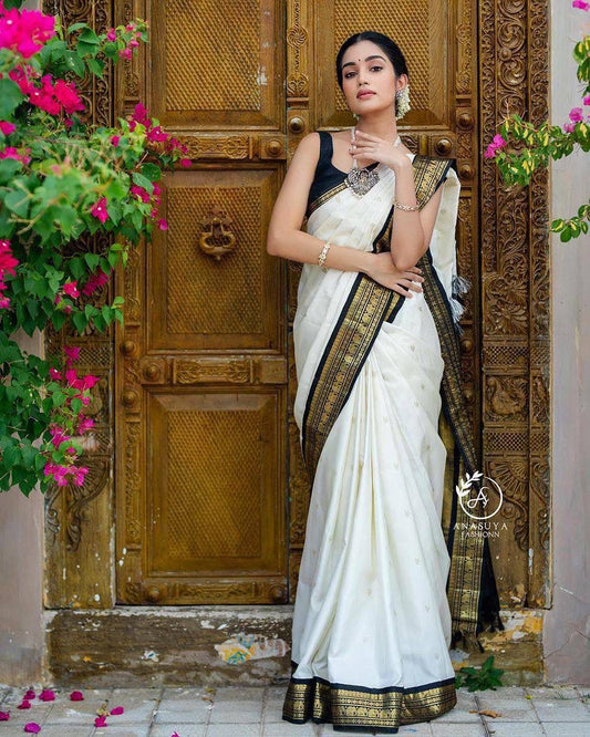 Moiety Off White Soft Banarasi Silk Saree With Panoply Blouse Piece