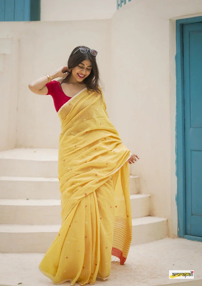 Stunning Yellow Cotton Silk Saree With Glowing Blouse Piece