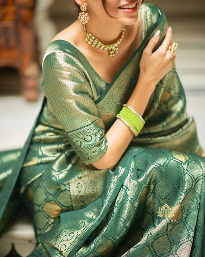Surpassing Dark Green Soft Silk Saree With Dazzling Blouse Piece