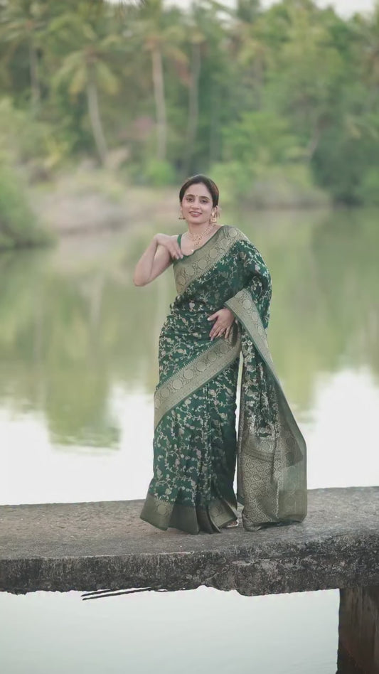 Surpassing Dark Green Soft Silk Saree With Dazzling Blouse Piece