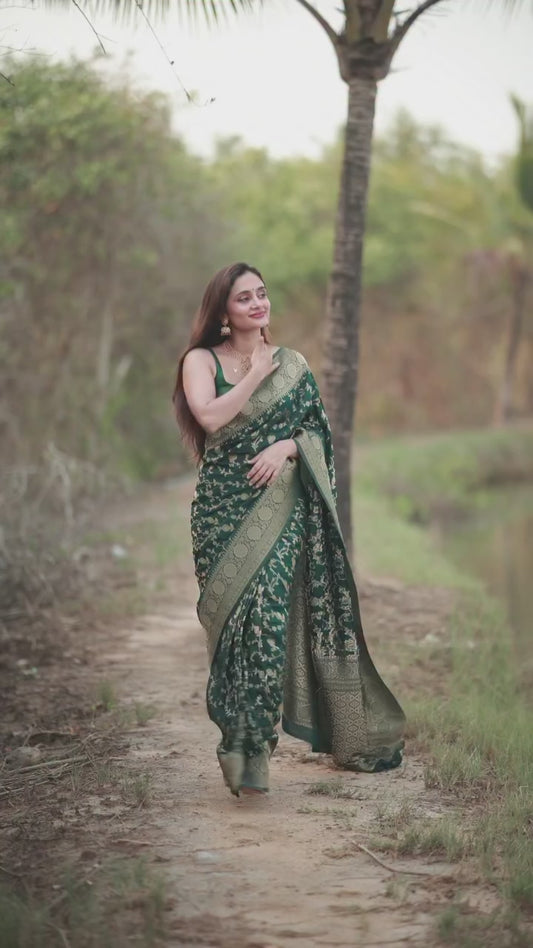 Surpassing Dark Green Soft Silk Saree With Dazzling Blouse Piece